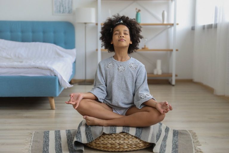 girl meditating in clean room